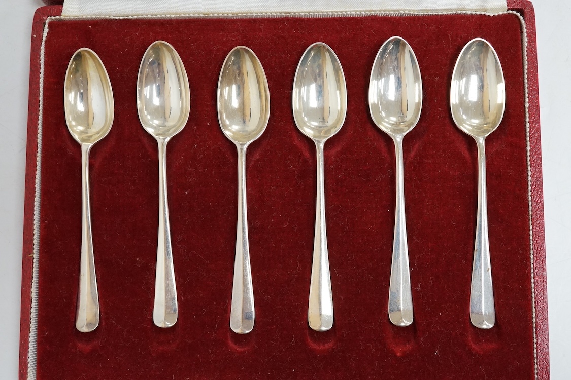 Three assorted silver christening sets including spoon, fork and napkin ring by William Hutton & Sons, London, 1896, one other set with steel knife, two cased sets of silver coffee spoons and a cased set of six Japanese